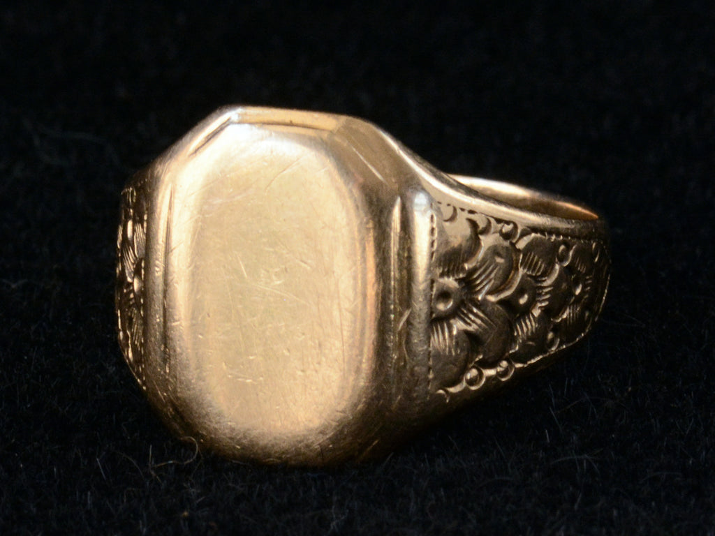 Right Side view of 1900's Men's Floral Rosy Gold Signet Ring (on black background)