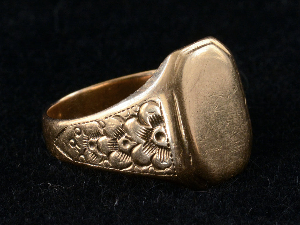 Left Side view of 1900's Men's Floral Rosy Gold Signet Ring (on black background)