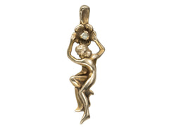 thumbnail of Gold vintage pendant in the form of a a woman hanging from a flower (shown on white background)
