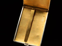 thumbnail of Open cigarette case showing gold interior