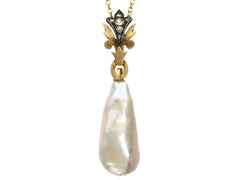 thumbnail of Detail of antique pendant with rose cut diamond and yellow gold top and large baroque pearl drop (shown on white background)
