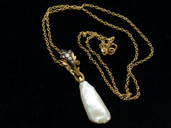 thumbnail of Antique pendant with rose cut diamond and yellow gold top and large baroque pearl drop on cable chain (shown on black background)