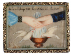 thumbnail of An antique Georgian-era rectangular brooch with hands and doves and the words "Friendship the Fountain of Love" with a gold frame. Shown on white background.