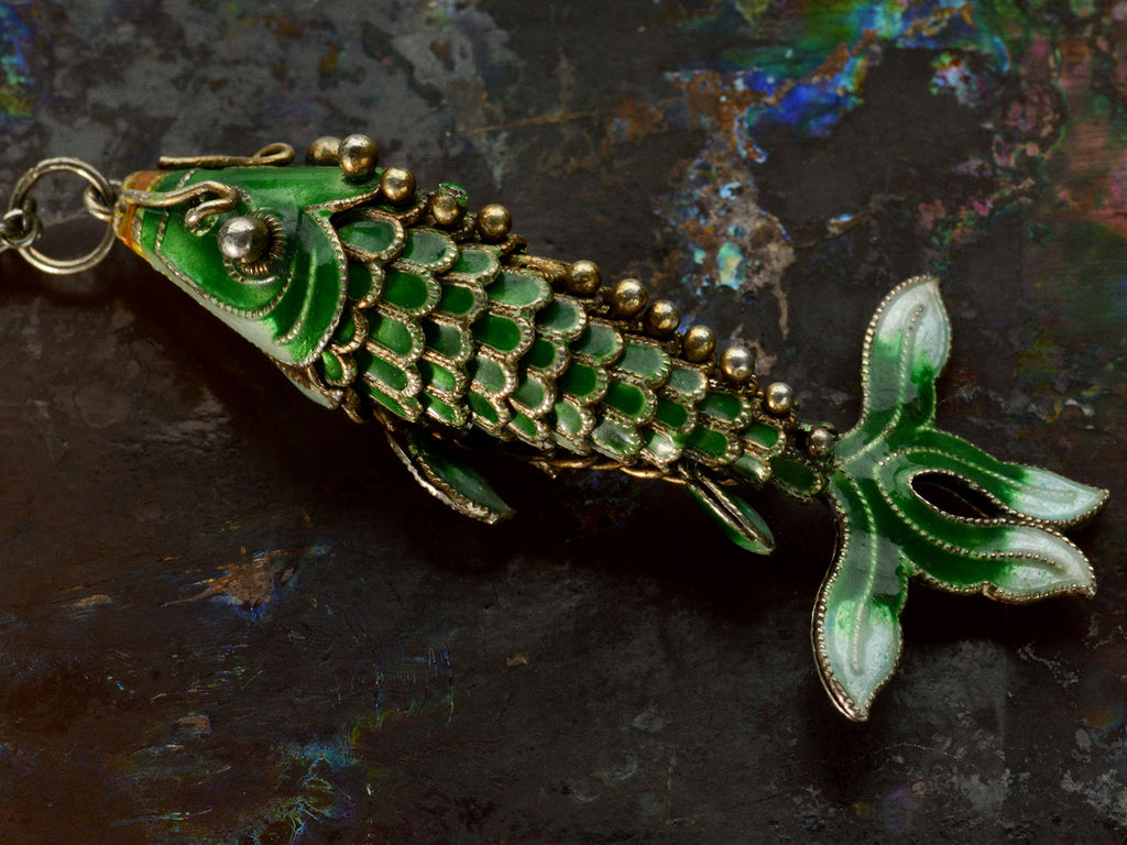 Detail of c1960 Green Enamel Fish Pendant (on dark colorful background)