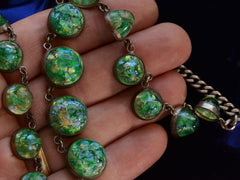 thumbnail of c1930 Iridescent Green Necklace (on hand for scale)