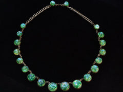 thumbnail of c1930 Iridescent Green Necklace (shown on black background)