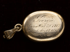 thumbnail of Reverse side of locket with engraved text "Georgies Born Oct 28 1863 Died Aug 17 1865" On black background.