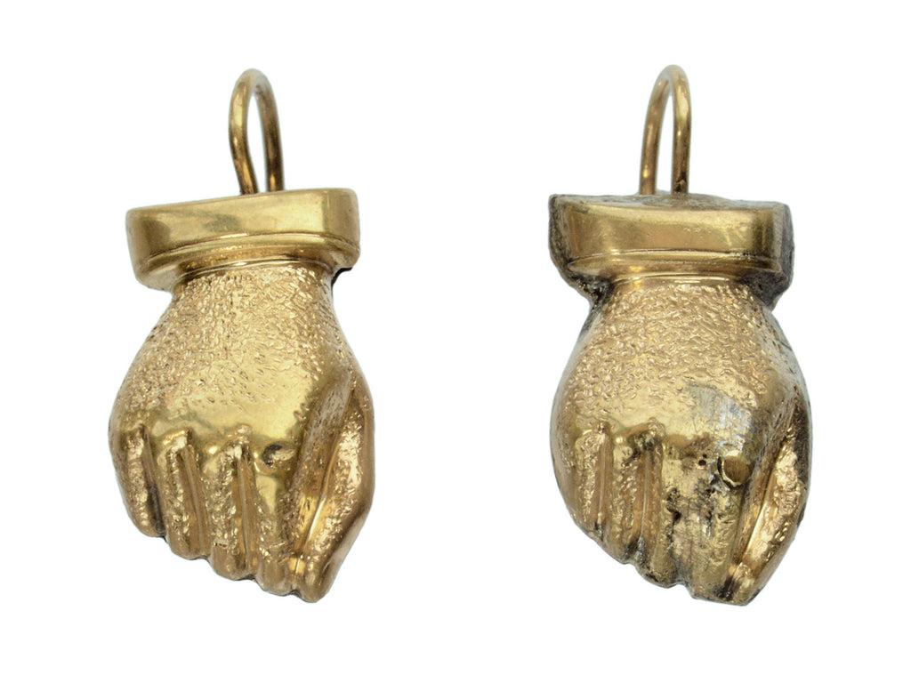 A pair of Victorian gold fist earrings (on white background)