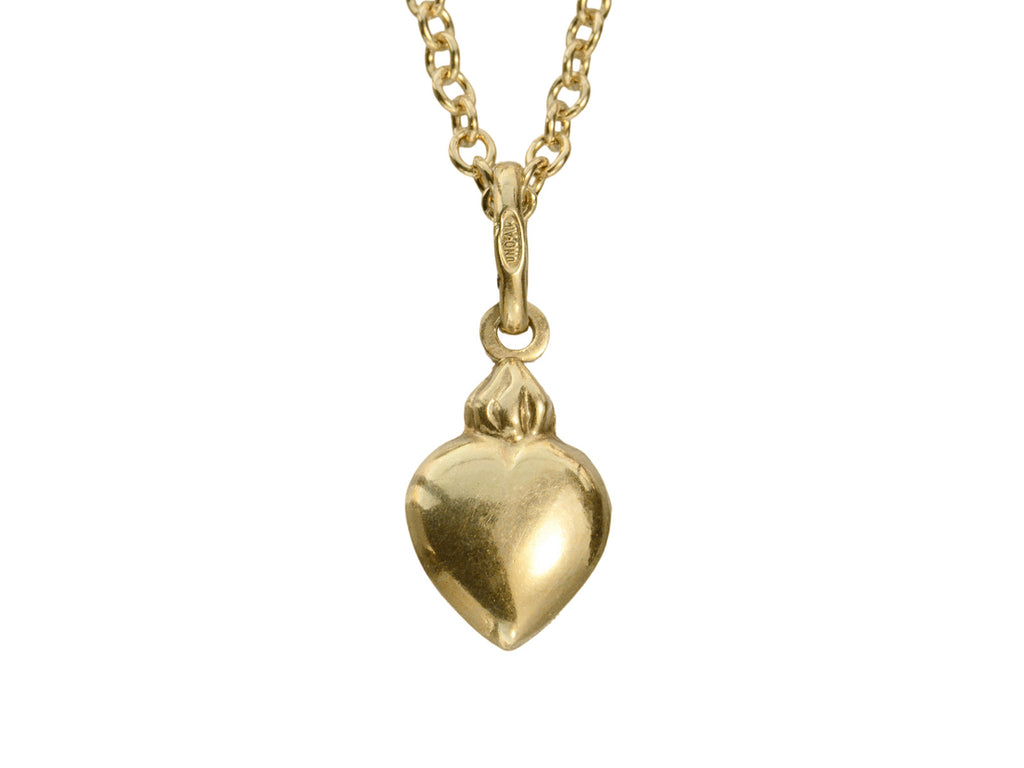 Yellow gold flaming heart shaped charm  hanging on a cable chain, shown on white background. A stamp on the the bale reads "UNO AR."