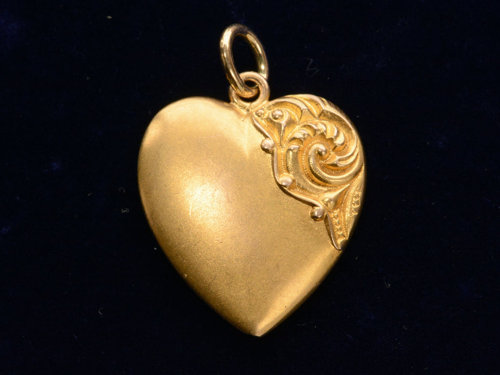 c1890 Fancy Heart Charm (on black background)