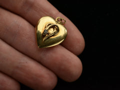 c1890 Snake Heart Pendant (on hand for scale)