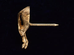 thumbnail of Side profile of vintage yellow gold tie tack in the form of a horse's ass. Showing pin. On black background. "14K" mark visible.