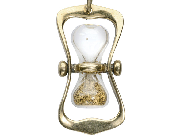 c1970 Yellow Gold Hourglass Pendant with Gold Flakes inside glass (on white background)