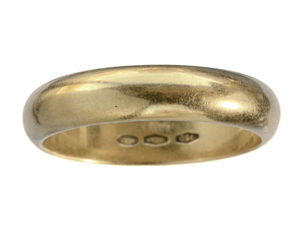 A rounded vintage 4.7mm 18K Italian wedding band, shown on white background.