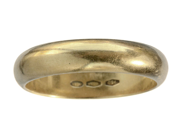 A rounded vintage 4.7mm 18K Italian wedding band, shown on white background.