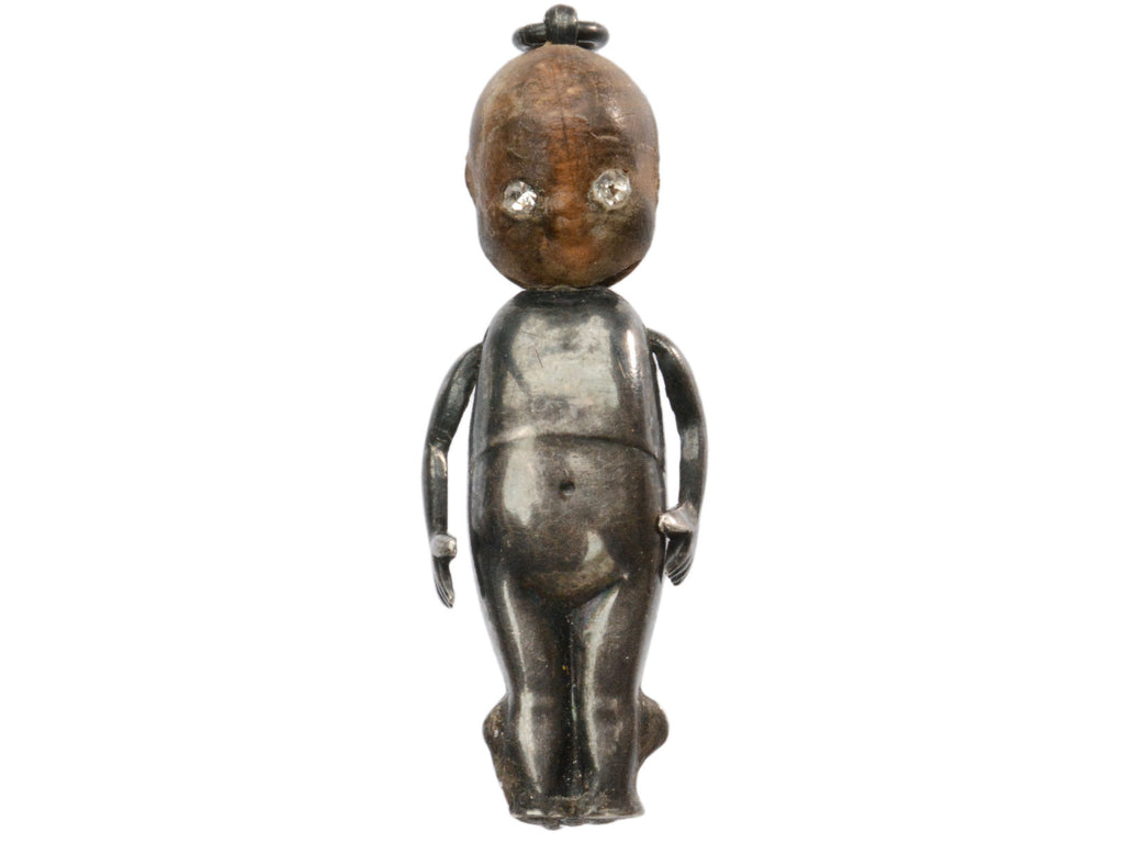 c1915 Kewpie Doll Charm with Oxidized Silver Body and Wooden Head (shown on white background)
