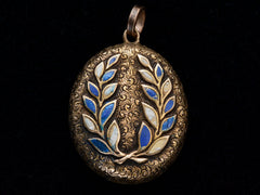 thumbnail of Oval antique gold locket with laurel design in blue and white enamel, shown on black background.