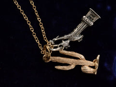 thumbnail of Reverse view of Vintage Silver Statue of Liberty and Gold Cactus Charms Necklace (on black background)