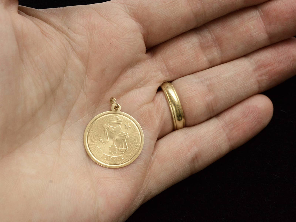 c1970 Gold Libra Charm (on hand for scale)