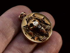 thumbnail of c1890 Victorian Lion Locket (on hand for scale)