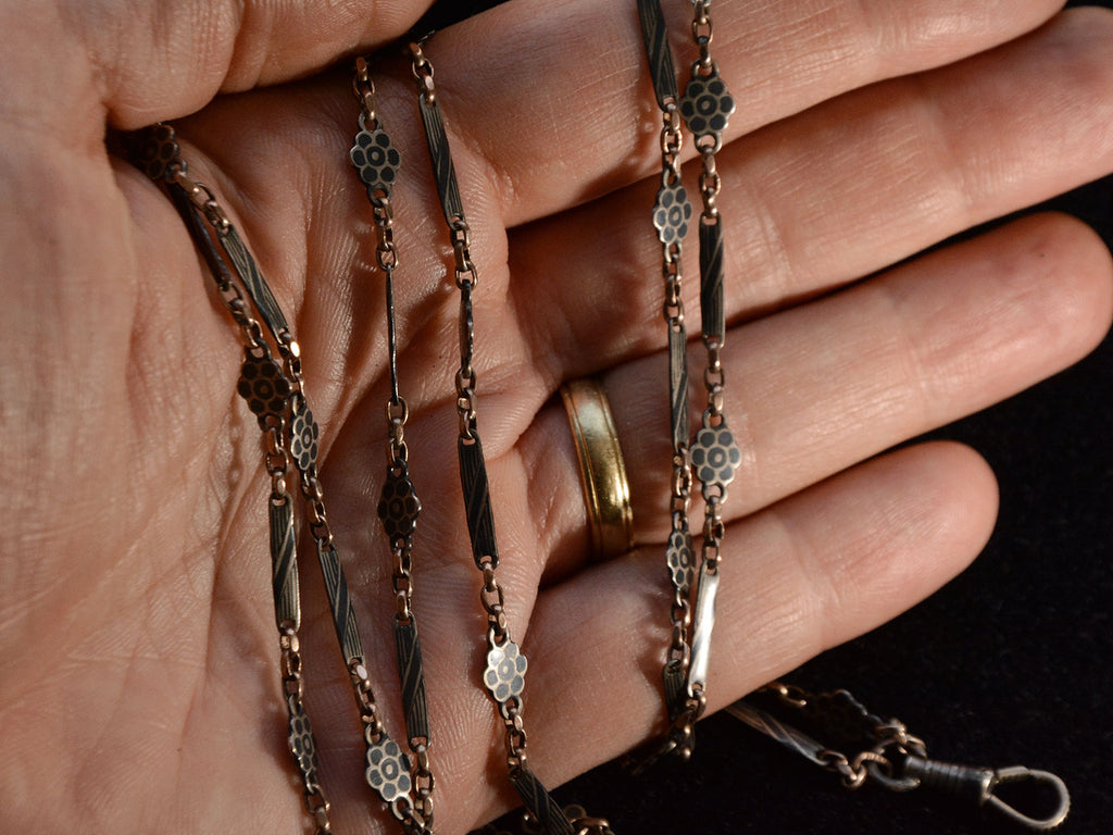 c1890 Long Niello Chain (shown on hand for scale)