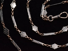 thumbnail of c1890 Long Niello Chain (detail of link decoration, shown on black background)