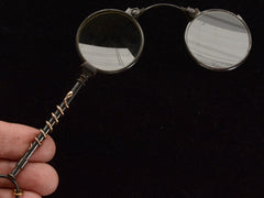 thumbnail of c1890 Snake Lorgnette (open view on hand for scale)