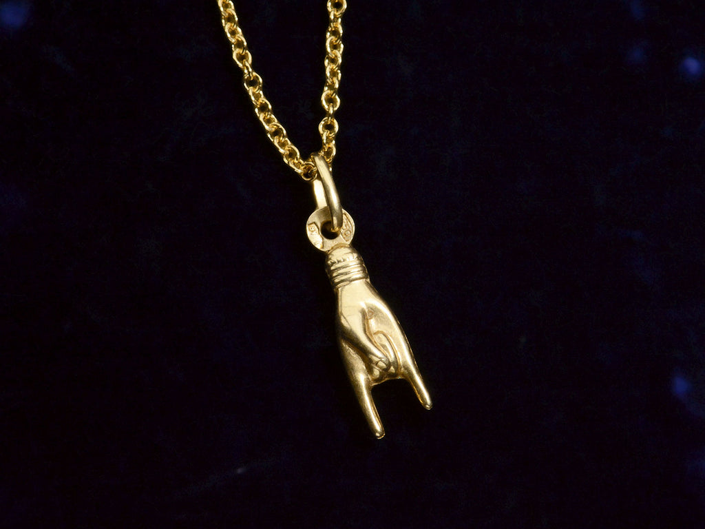 Vintage Yellow Gold Sign of the Horns Hand Pendant on Chain (shown on dark background). Stamps visible are Italian hallmarks reading "1 AR" and "750"