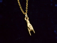 thumbnail of Vintage Yellow Gold Sign of the Horns Hand Pendant on Chain (shown on dark background). Stamps visible are Italian hallmarks reading "1 AR" and "750"