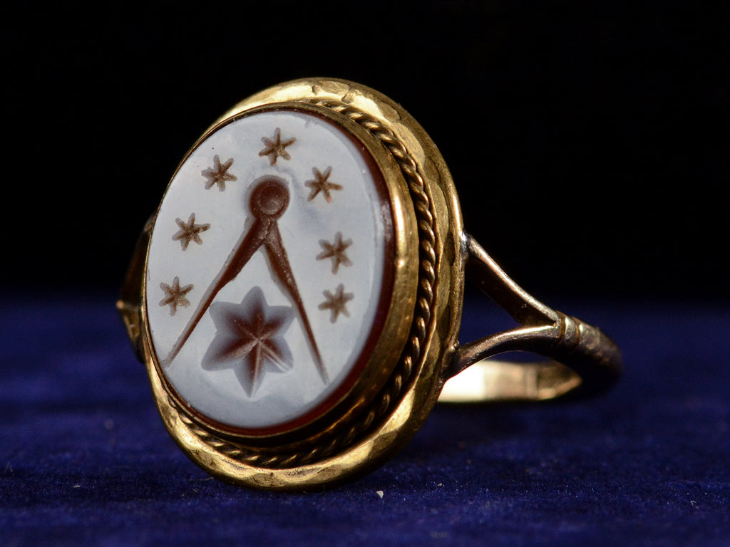 c1900 Masonic Intaglio Ring (right side view on dark blue background)