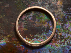 thumbnail of Side view of vintage Men's Diamond Band in Platinum and Rose Gold (shown on dark colorful background)