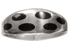 thumbnail of A vintage silver bracelet with inset oval black onyx polka-dots, shown on white background.
