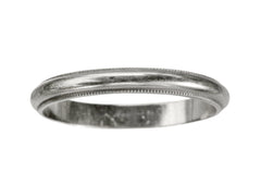thumbnail of A 14K white gold c1940 wedding band with milgrain edges, shown on white background.