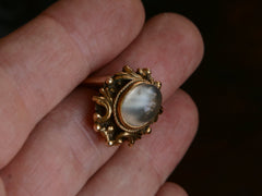 thumbnail of c1920 Nouveau Moonstone and Gold Ring (on hand for scale)