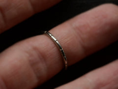 thumbnail of c1930 Patterned Narrow 18K White Gold Wedding Band, on finger