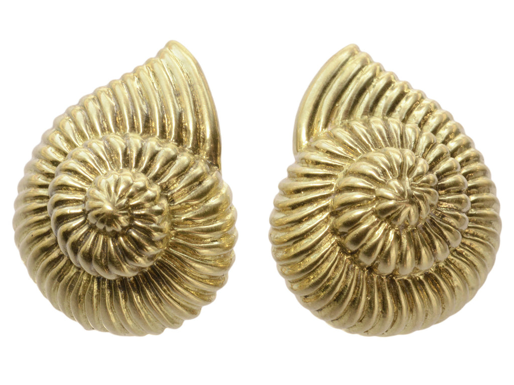 Pair of yellow gold ammonite shaped earrings, shown on white background.