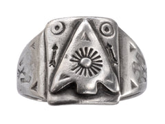 thumbnail of Front view of c1930 Navajo silver signet ring with an arrowhead design and eagles stamped on the shoulders, shown on white background.