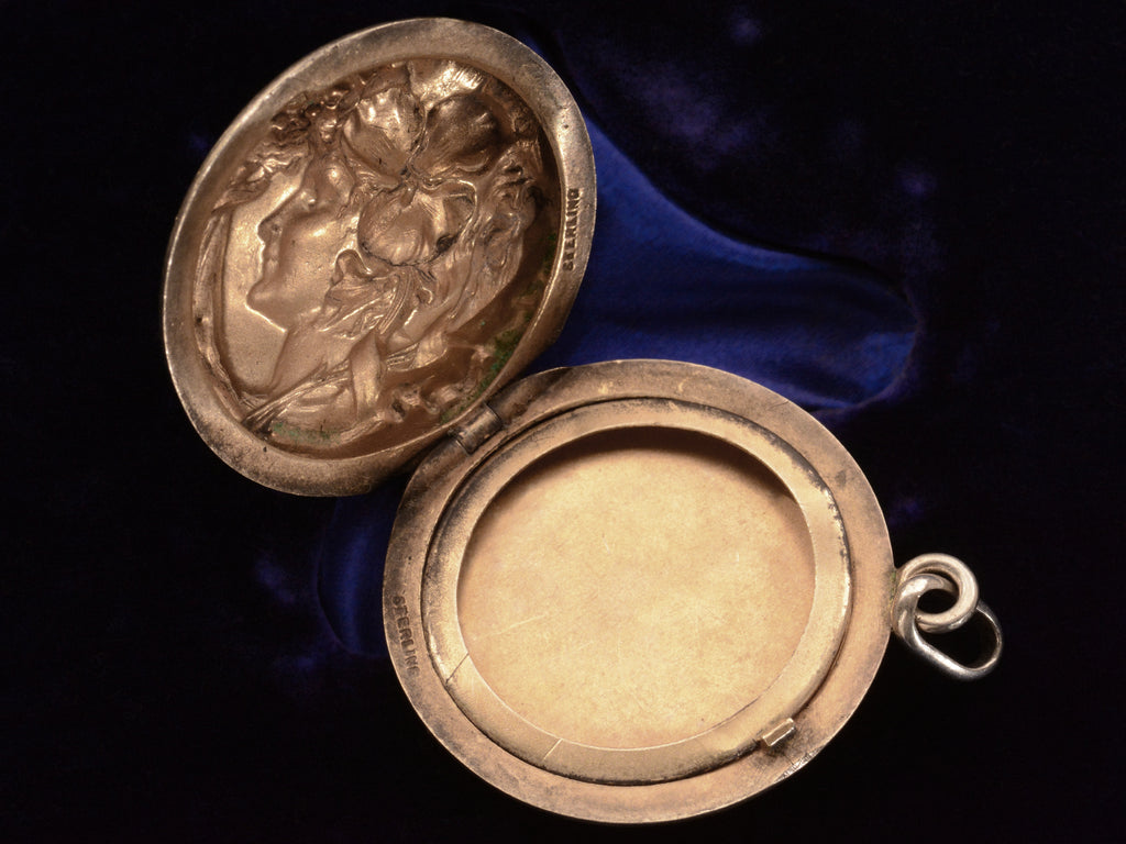 Open view of c1900 Art Nouveau Silver Locket (stamped "STERLING")