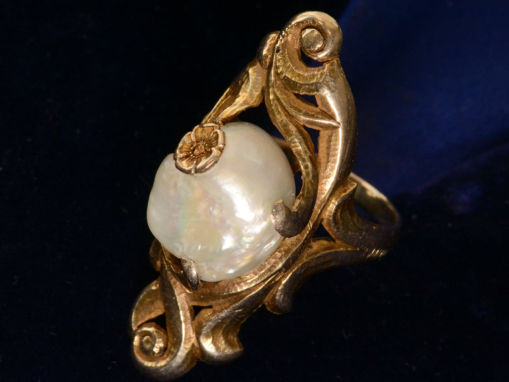 Right angled view of c1890 Nouveau Pearl and Gold Ring (on black background)