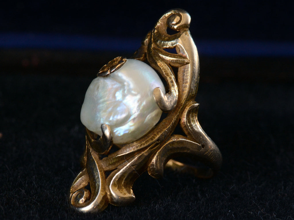 Right angled view of c1890 Nouveau Pearl and Gold Ring (on black background)