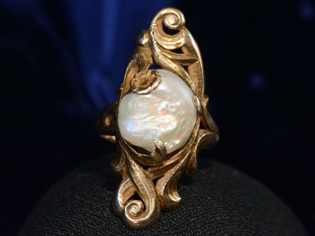 Front view of c1890 Nouveau Pearl and Gold Ring (on black background)