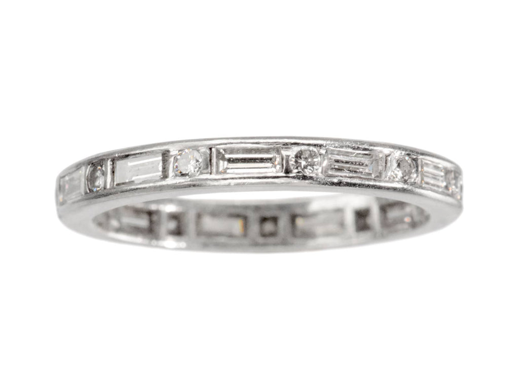 c1950 Oscar Heyman Eternity Band with Baguettes and Round Diamonds in Platinum (shown on white background)