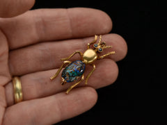 thumbnail of c1890 Opal Bug Brooch (on hand for scale)