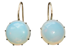 thumbnail of A vintage pair of round opaline glass earrings with blackened silver settings and 14K yellow gold ear wires. Shown on white background.