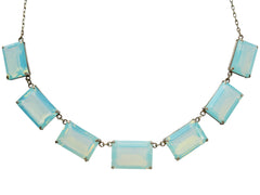 thumbnail of A vintage c1950 silver necklace with a bib of rectangular opalescent glass stones, shown on white background.