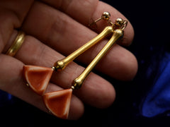 thumbnail of c1930 Deco Drop Earrings in Gilt Metal and Orange Plastic (shown on hand for scale)