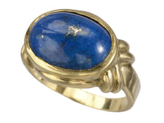 thumbnail of A vintage c1980 ring with an oval blue lapis lazuli set in 18K yellow gold, shown on white background.
