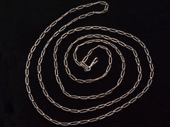 thumbnail of c1900 Long Silver and Gold Filled Chain (shown on black background)