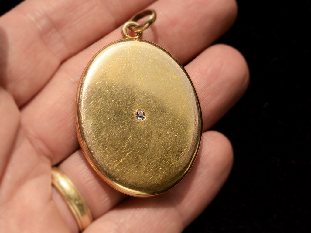 c1900 Large Oval Diamond Locket (on hand for scale)