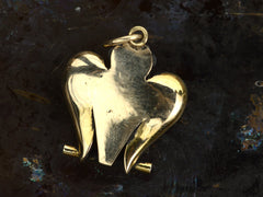 thumbnail of Back view of antique c1890 owl pendant shown on dark background.